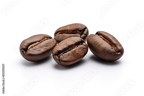 Coffee beans on isolated white surface closeup