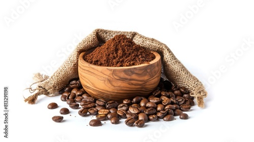 Roasted coffee beans in sack bag with coffe powder in wooden bowl isolated on white background