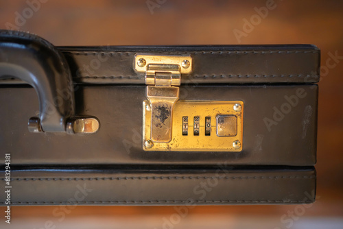 Old briefcase with lock code. photo