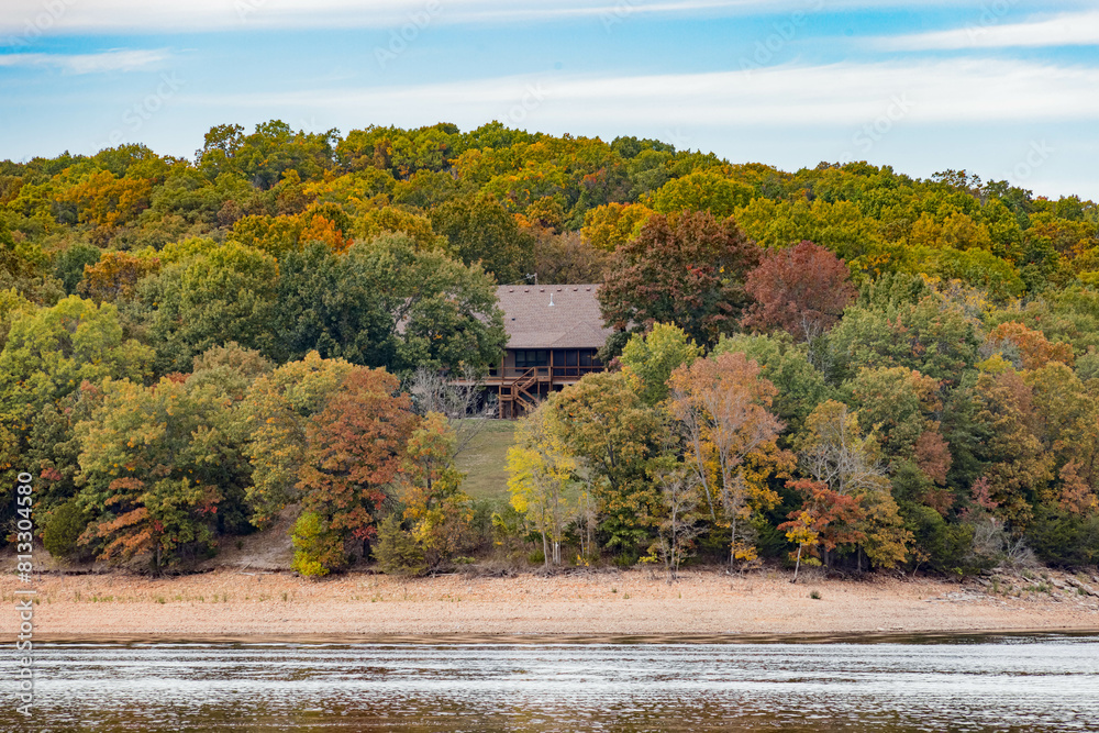 Fototapeta premium Sunny view of the beautiful fall color of Hobbs State Park-Conservation Area