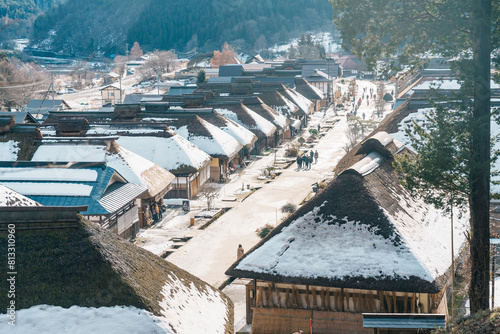 Ouchi Juku ancient farmer house village with snow in winter, former post town along the Aizu-Nishi Kaido trade route during the Edo Period. Shimogo town, Minamiaizu, Fukushima Prefecture, Japan photo