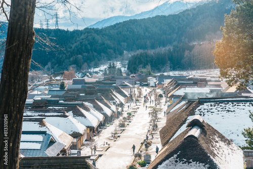 Ouchi Juku ancient farmer house village with snow in winter, former post town along the Aizu-Nishi Kaido trade route during the Edo Period. Shimogo town, Minamiaizu, Fukushima Prefecture, Japan photo