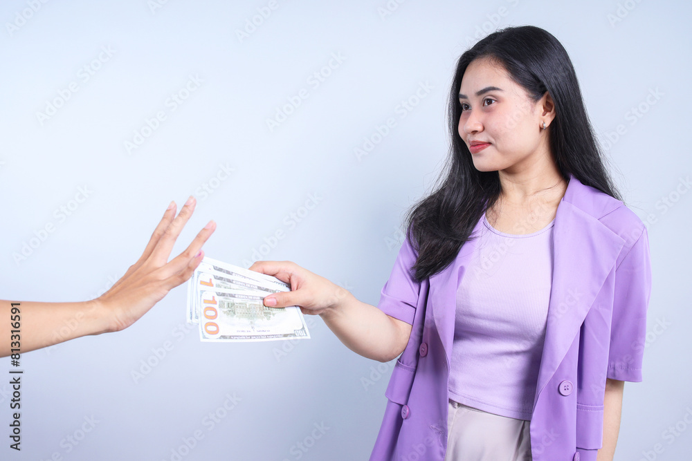 Pretty Young Woman Give Bribe Money To People. Hand Refuse Bribery. Say No To Corruption. Pretty Young Woman Give Bribe Money To People. Hand Refuse Bribery. Say No To Corruption.
