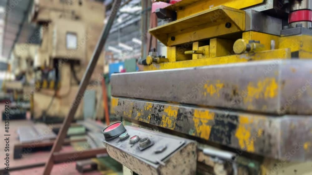 Powerful press machine in industrial factory, close up view Powerful press machine in industrial factory, close up view