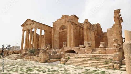 Ruins of ancient Roman capitol forum on territory of antic city of Sufetula in area of modern Tunisia. Half-destroyed buildings from time of Roman Empire. Roman Forum of Sufetula  photo