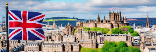 the flag of Great Britain on the background of the city of Edinburgh. Fringe Arts Festival in Edinburgh