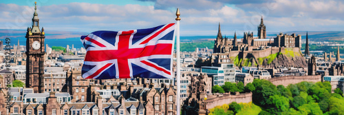 the flag of Great Britain on the background of the city of Edinburgh. Fringe Arts Festival in Edinburgh