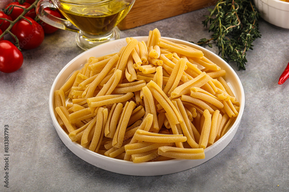 Raw dry Italian pasta - casarecce Raw dry Italian pasta - casarecce