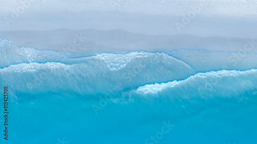 Ocean Tropical Beach with the soft wave water of the sea on the sandy beach background