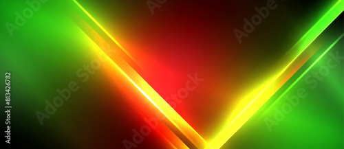 a red , yellow , and green light beam on a black background . High quality