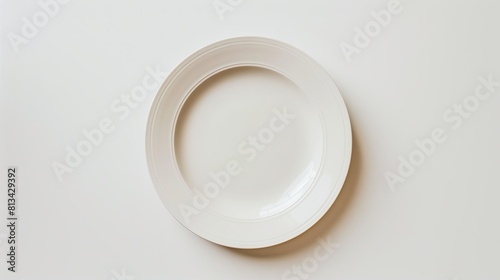 Top view of empty plate on white background 