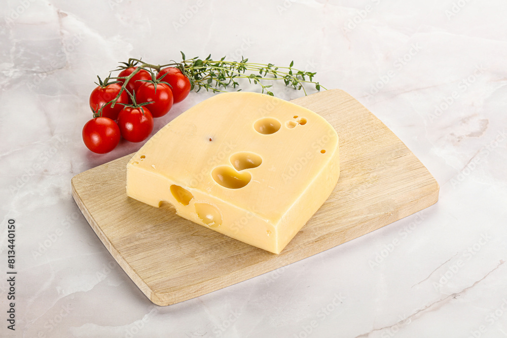 Maasdam cheese brick over board Maasdam cheese brick over board