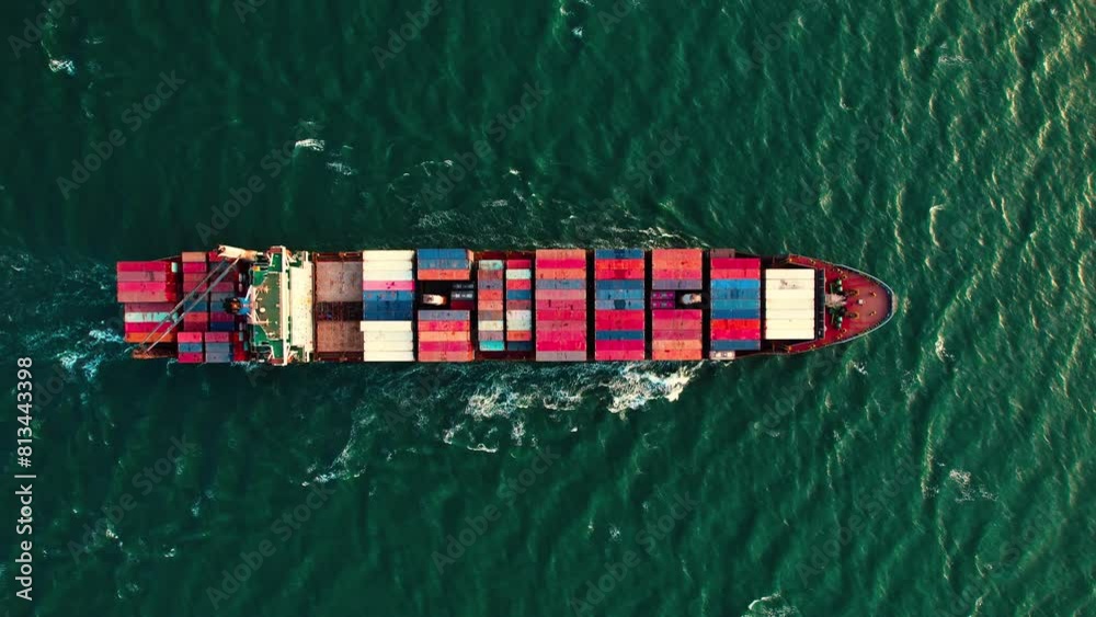 Aerial view of a large cargo container ship sailing on the sea or ocean for logistics import export, shipping or transportation