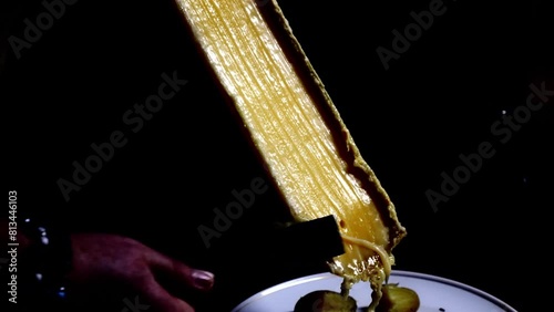 Wallpaper Mural Man Scraping Swiss Traditional Melted Raclette Cheese in Canton of Valais in Switzerland. Torontodigital.ca