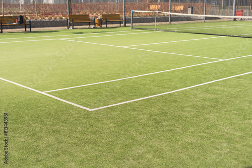 View of multi-functional sports area with tennis courts
