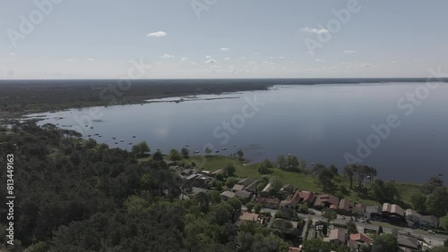Wallpaper Mural Lake Lacanau and the village of Le Moutchic west of Bordeaux France, Aerial flyover shot Torontodigital.ca