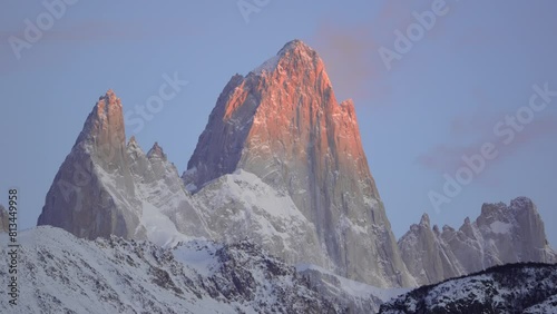 Fiery dawn timelapse illuminates Mount Fitz Roy in Patagonia, Argentina with warm colors  photo