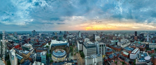 Ultra wide aerial panorama of Manchester cityscape at Dawn  photo