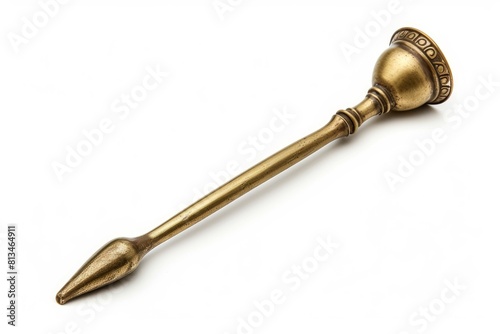 Antique brass candle snuffer photo on white isolated background photo