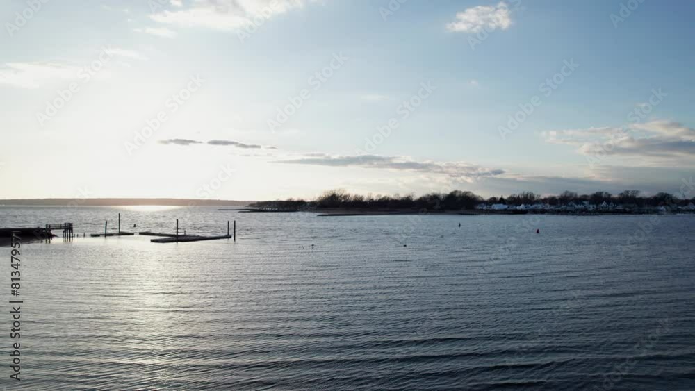 Rising drone shot over the water at brush neck cove in Warwick, Rhode Island. Rising drone shot over the water at brush neck cove in Warwick, Rhode Island.