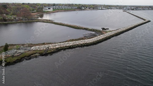 Construction of a safe harbor with the dikes in the water in Warwick, Rhode Island. photo