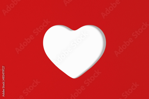 Cut out heart shape on red paper background. © Cagkan