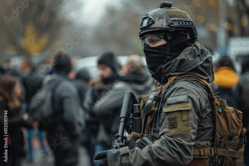a member of the security force keeps order at a public event © xadartstudio