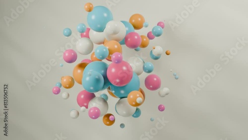 3D animation of an array of colorful spheres that appear and disappear. Smooth endless appearance and disappearance of balls. Loop abstract 3d animation.