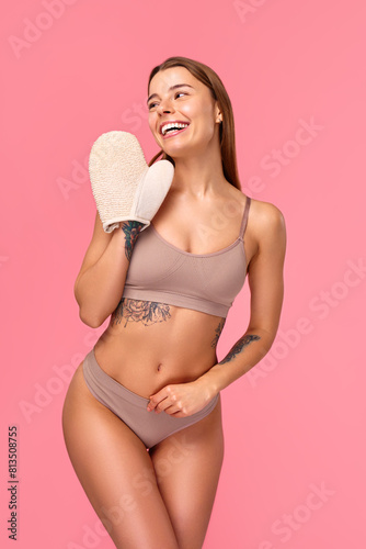Cosmetology, beauty and spa treatment. Woman in lingerie on pink background.