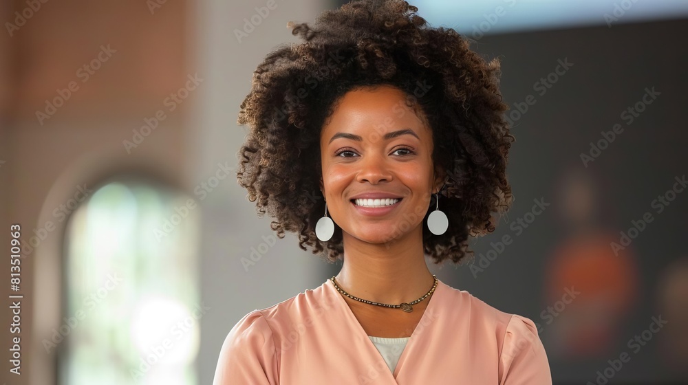 A confident speaker with a warm smile, radiating positive energy and inspiring the audience A confident speaker with a warm smile, radiating positive energy and inspiring the audience