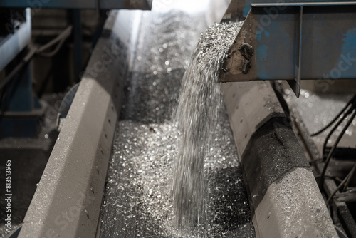 conveyor belt - aluminum particles - detail of an important raw material