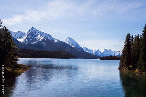 Summer landscape and people kayaking and fishing in Maligne lake  Jasper National Park  Canada