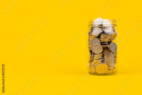 Saving money in a glass jar creates financial discipline, good accounting and planning for investing in the stock market and mutual funds.