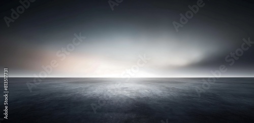 A dark background with concreate floor with sun set effects photo