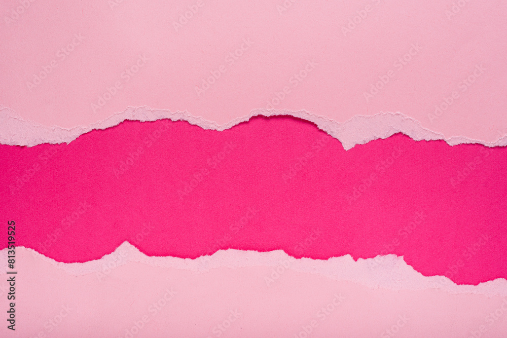 Torn pink paper on dark pink background. Space for text. Torn pink paper on dark pink background. Space for text.