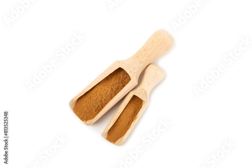 Cinnamon powder isolated on white background. Spicy spice for baking, desserts and drinks. Fragrant ground cinnamon.