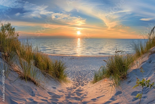 Seaside Sunset  Sand  Grass  and Ocean Waves against a blurry background of beach and sky