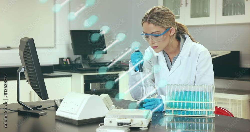 Image of dna strand over caucasian female doctor in lab Image of dna strand over caucasian female doctor in lab