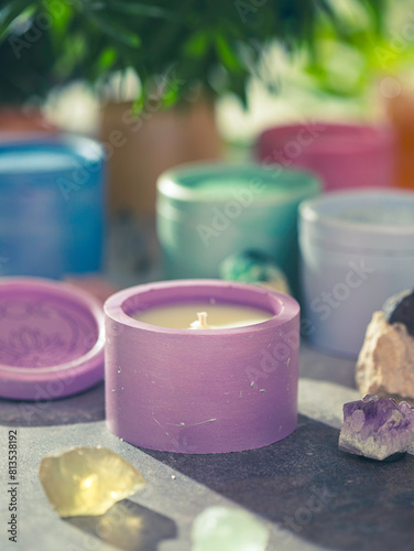 Candles in plaster candlesticks, colors of the 7 chakras, alternative medicine. Energy healing. Aromatherapy. Alternative medicine. Selective focus