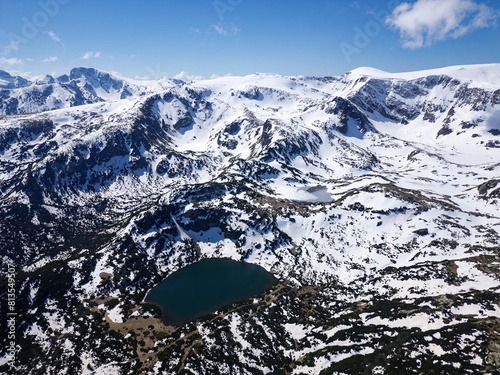 Obraz na płótnie Aerial view of the Seven Rila lakes. Located high in the Rila mountains in Bulgaria this is the most visited natural site in the country. Springtime with snow remaining in the mountains.
w salonie