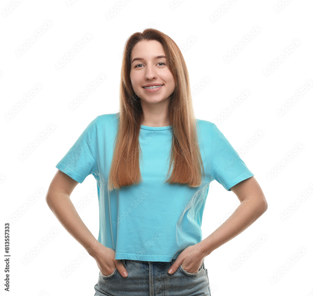 Portrait of smiling woman with dental braces on white background Portrait of smiling woman with dental braces on white background