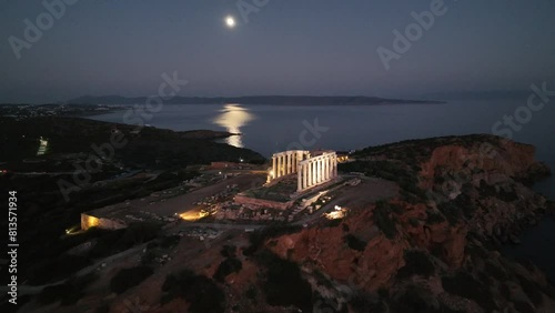 Aerial of the Temple of Poseidon in the evening on Cape Sounion, Greece. photo