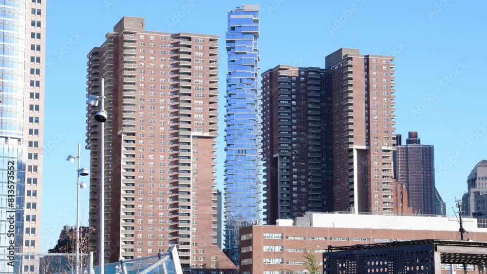 Modern skyscrapers in Tribeca, New York City against the daytime blue sky