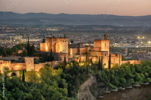 Historic Alhambra palace at night in Granada  Andalusia  Spain
