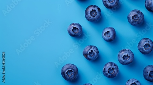 A ripe blueberry surrounded by some blueberry clusters