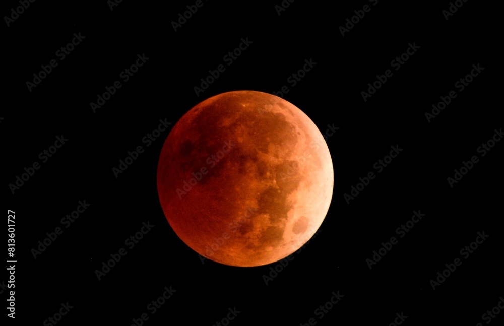 Fototapeta premium Blood moon isolated on black background