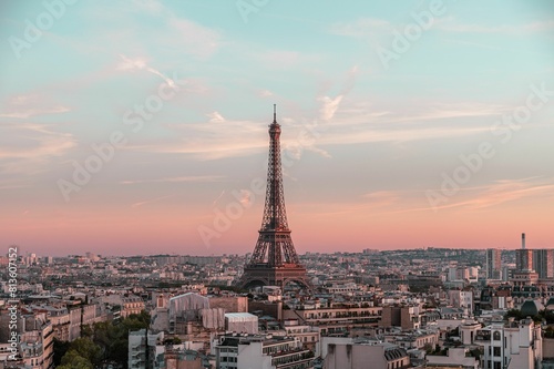 Photography Drone shot of the Eifel tower and surrounding buildings in Paris, France