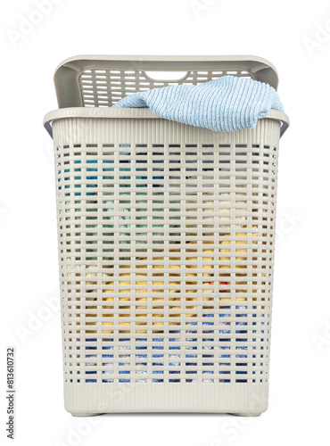 Beige plastic laundry basket filled with dirty towels, isolated on a white background, isolated on a transparent background png