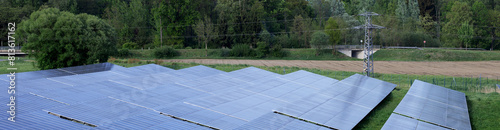Banner 4x1 Linkedin Long rows of solar panels in the countryside in the spring
