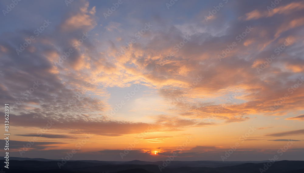 Real majestic sunrise sundown sky background with gentle colorful clouds.